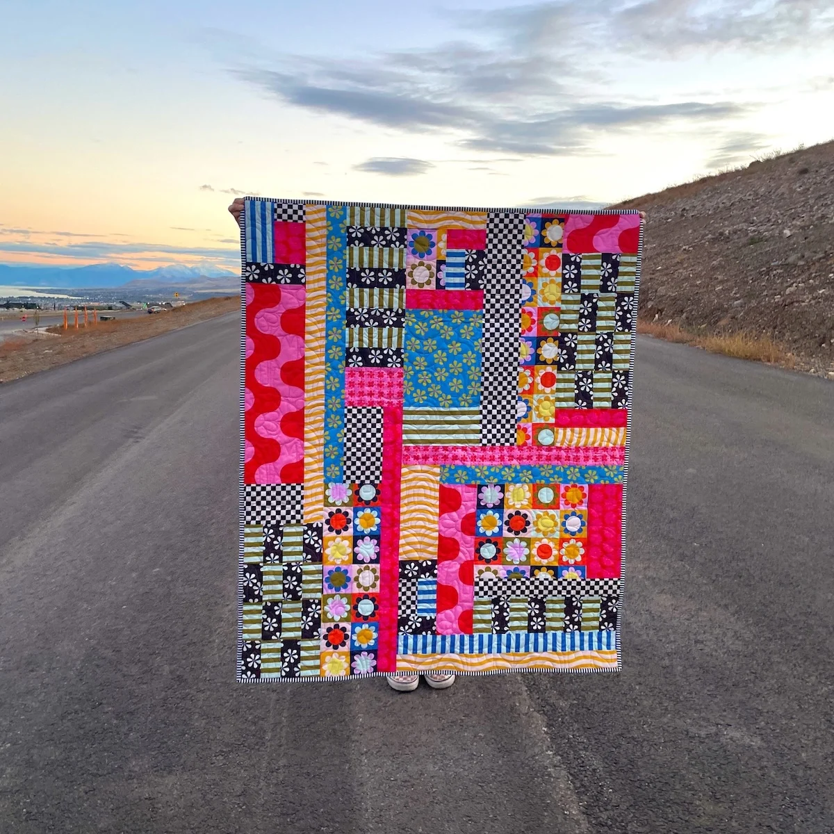 A bright quilt made with petal signature cotton
