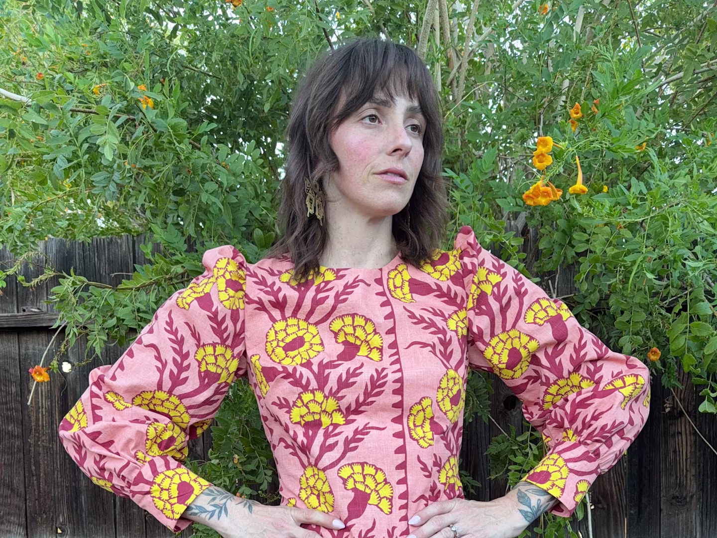 Kelsey Garner in a bright boho dress an abstract floral pattern