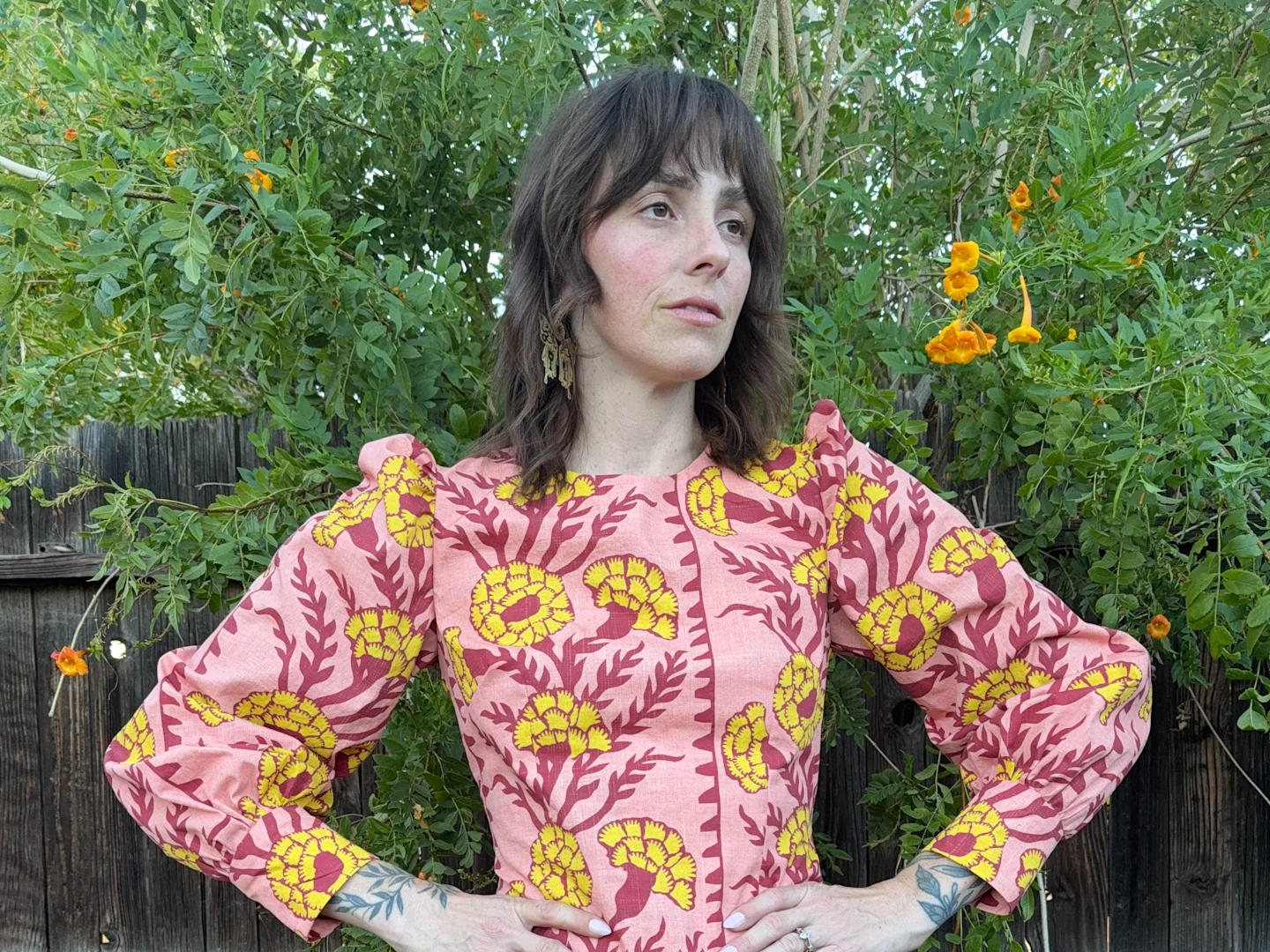 Kelsey Garner in a bright boho dress an abstract floral pattern