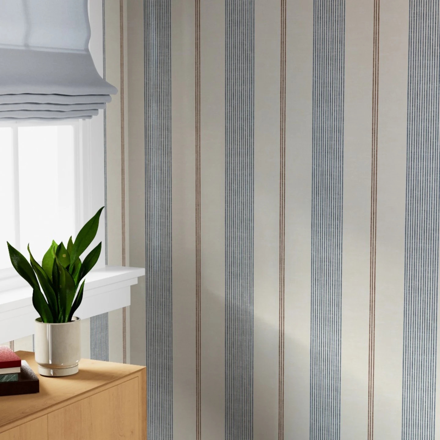 Blue and cream ticking stripe wallpaper in a living space.