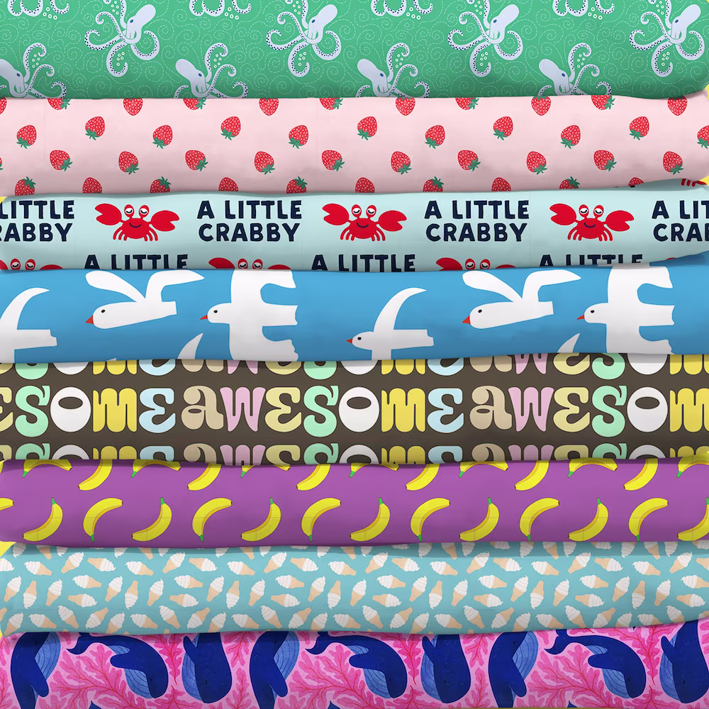 Stack of colorful kids fabrics