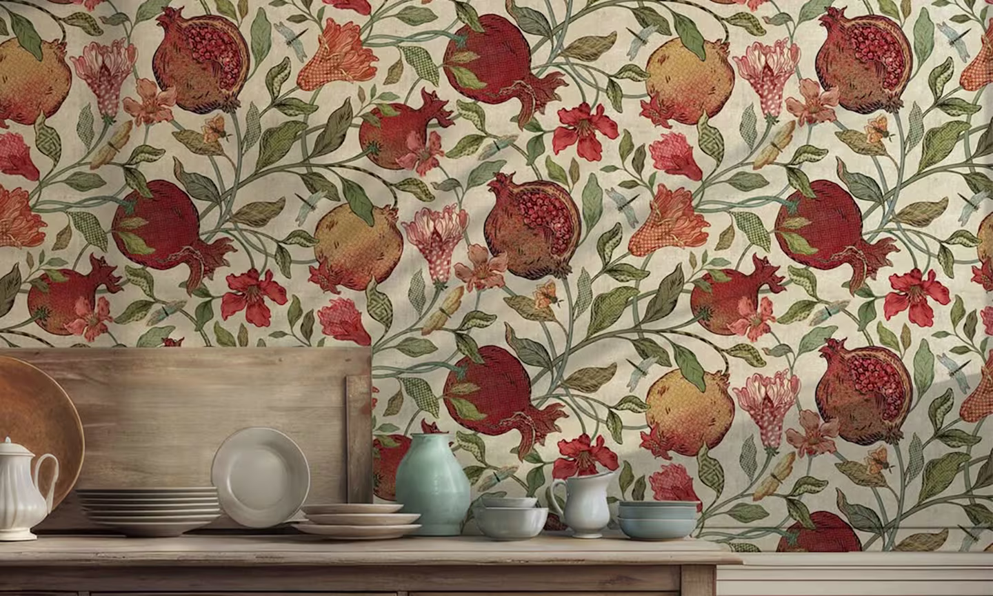 Kitchen area with wallpaper that has a fresco pomegranate design.