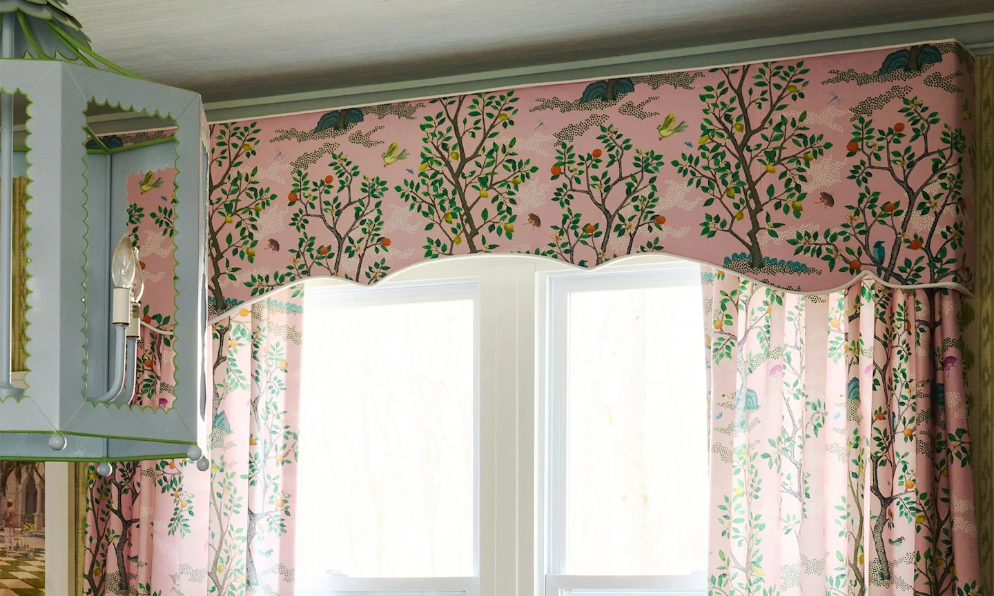 Window with pink curtains.