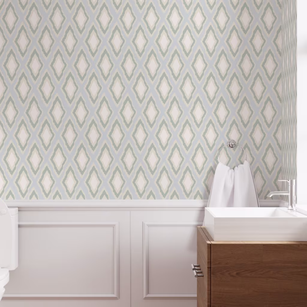 Bathroom with wallpaper in an ikat trellis design.