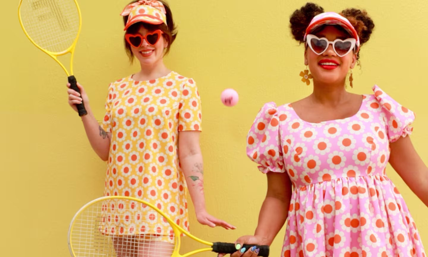 Keiko Lynn and Color Me Courtney wearing outfits made from sport stretch woven while playing tennis.