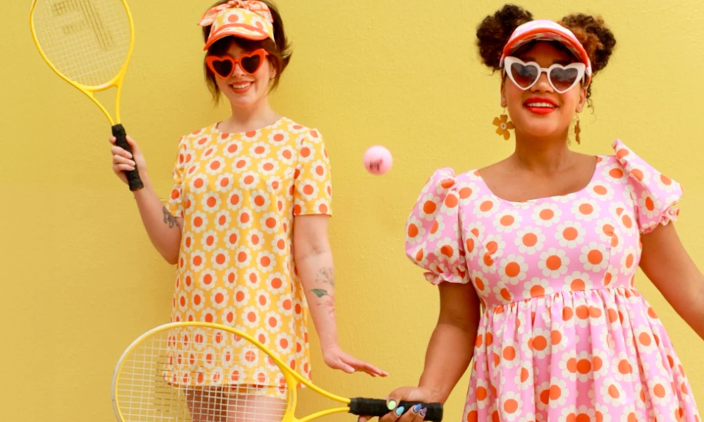 Keiko Lynn and Color Me Courtney wearing outfits made from sport stretch woven while playing tennis.