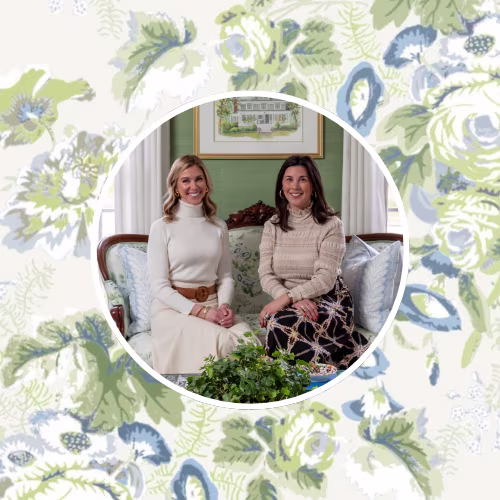 Caroline Walker and Maddie Hazelgrove in front of a floral chintz pattern in blue and green.
