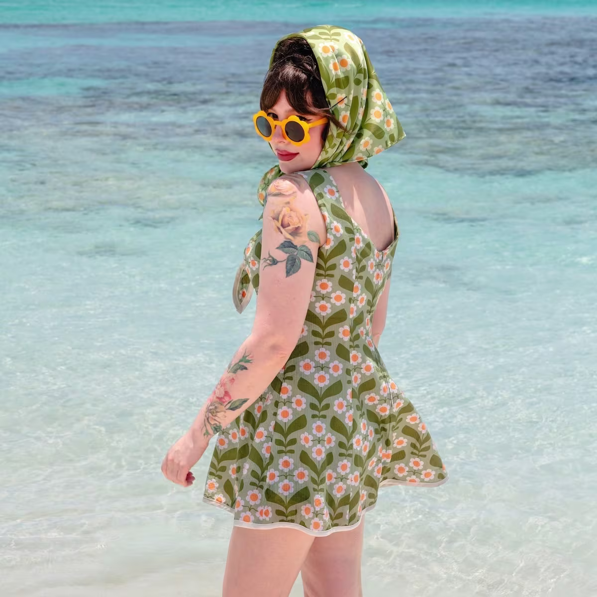 Keiko Lynn wearing a green floral dress made with seersucker