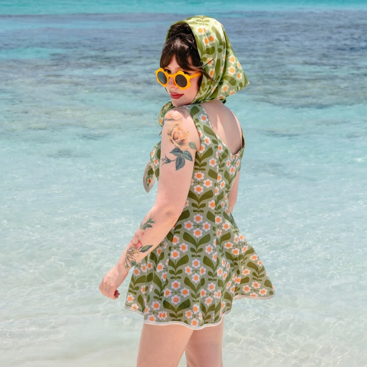 Keiko Lynn wearing a green floral dress made with seersucker