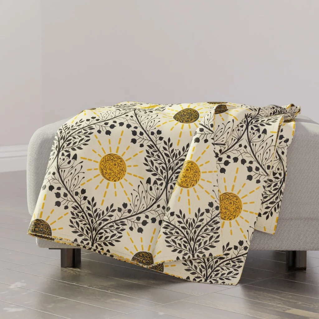 a Refined Boho Throw Blanket with a celestial print