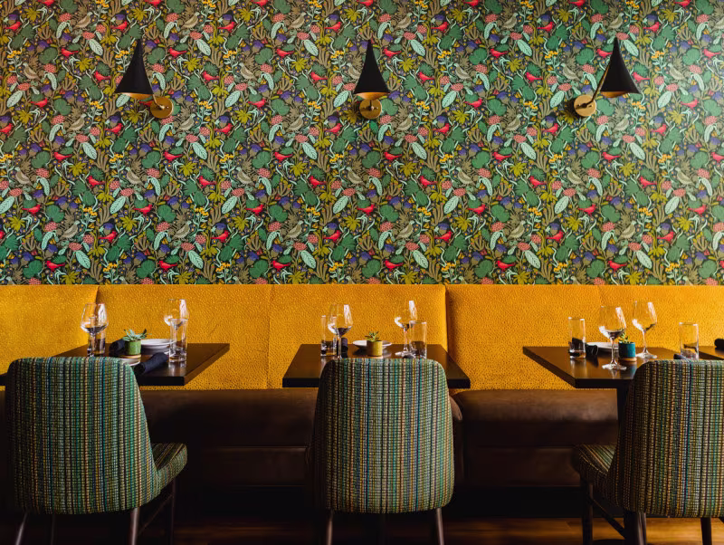 Wallpaper hung in hotel dining area