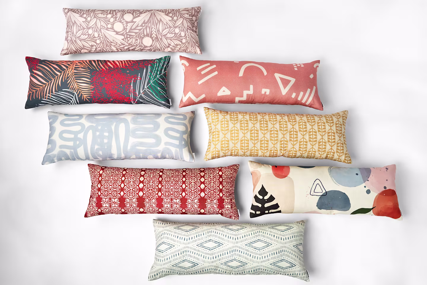 Multiple colorful extra long lumbar pillow