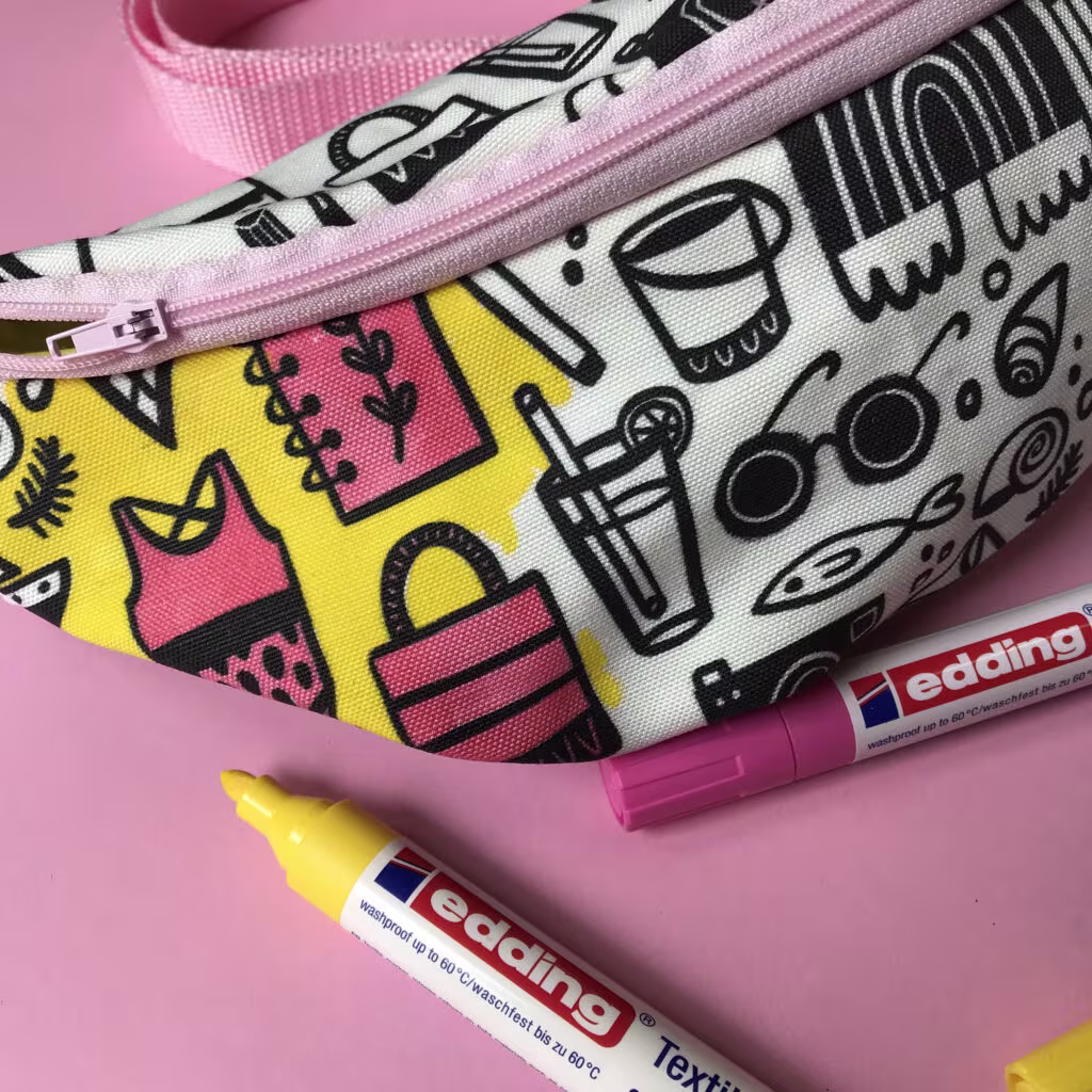 Black and white beach fanny pack partially colored in with yellow fabric marker | Spoonflower Blog