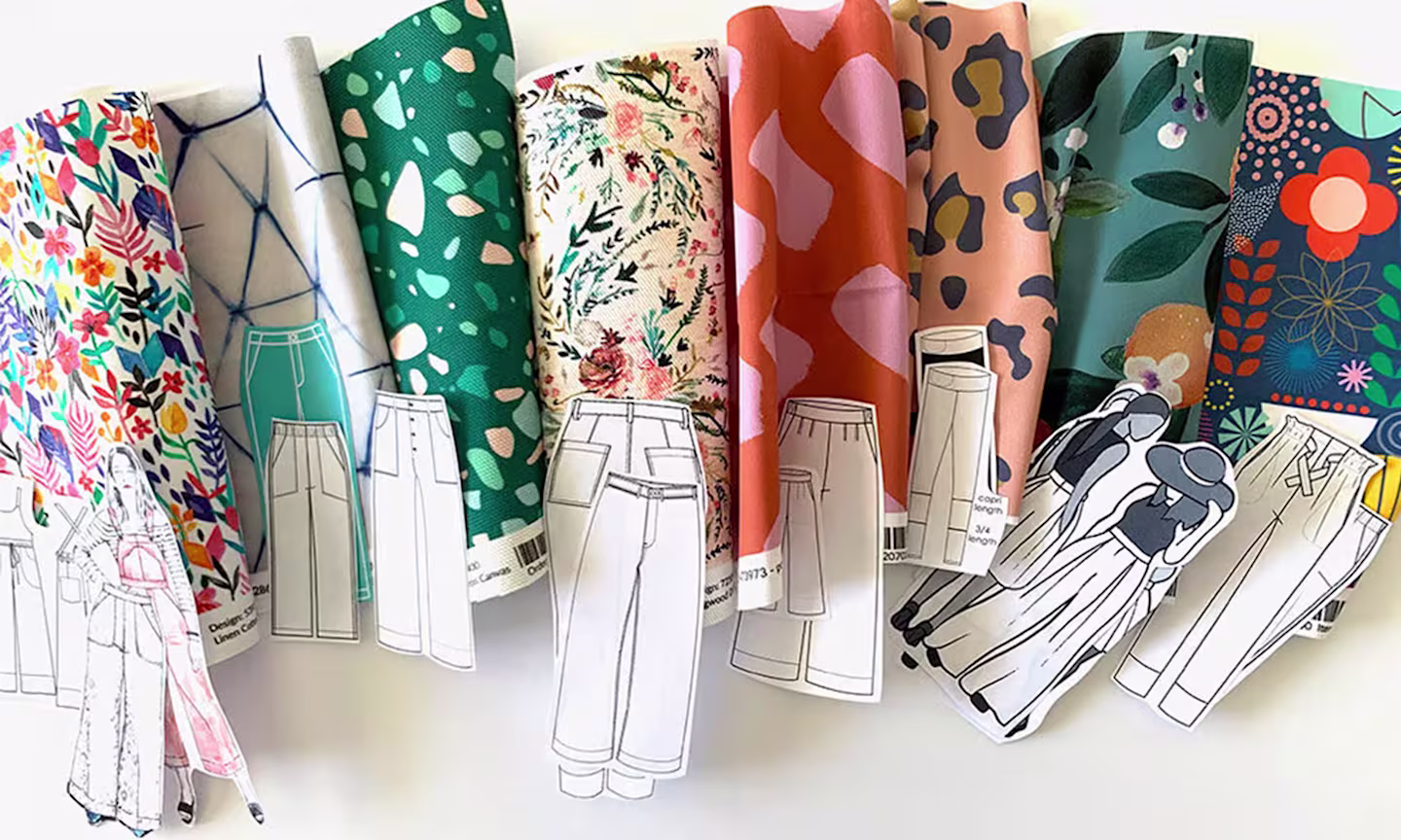 Fabric swatches next to cutout sketched of pants patterns.