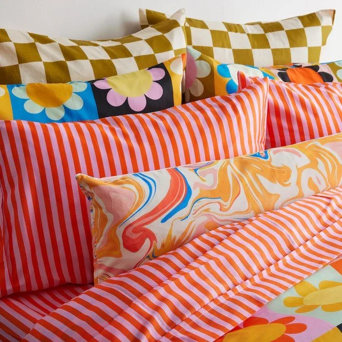 Close-up of Perennial Sateen Grand fabric showing its silky sateen weave and refined texture