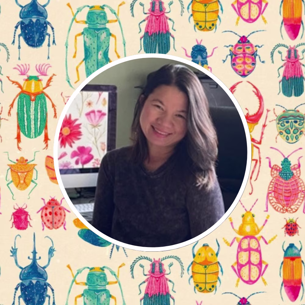 Headshot of Spoonflower artist Grace Andersson in front of one of her designs.