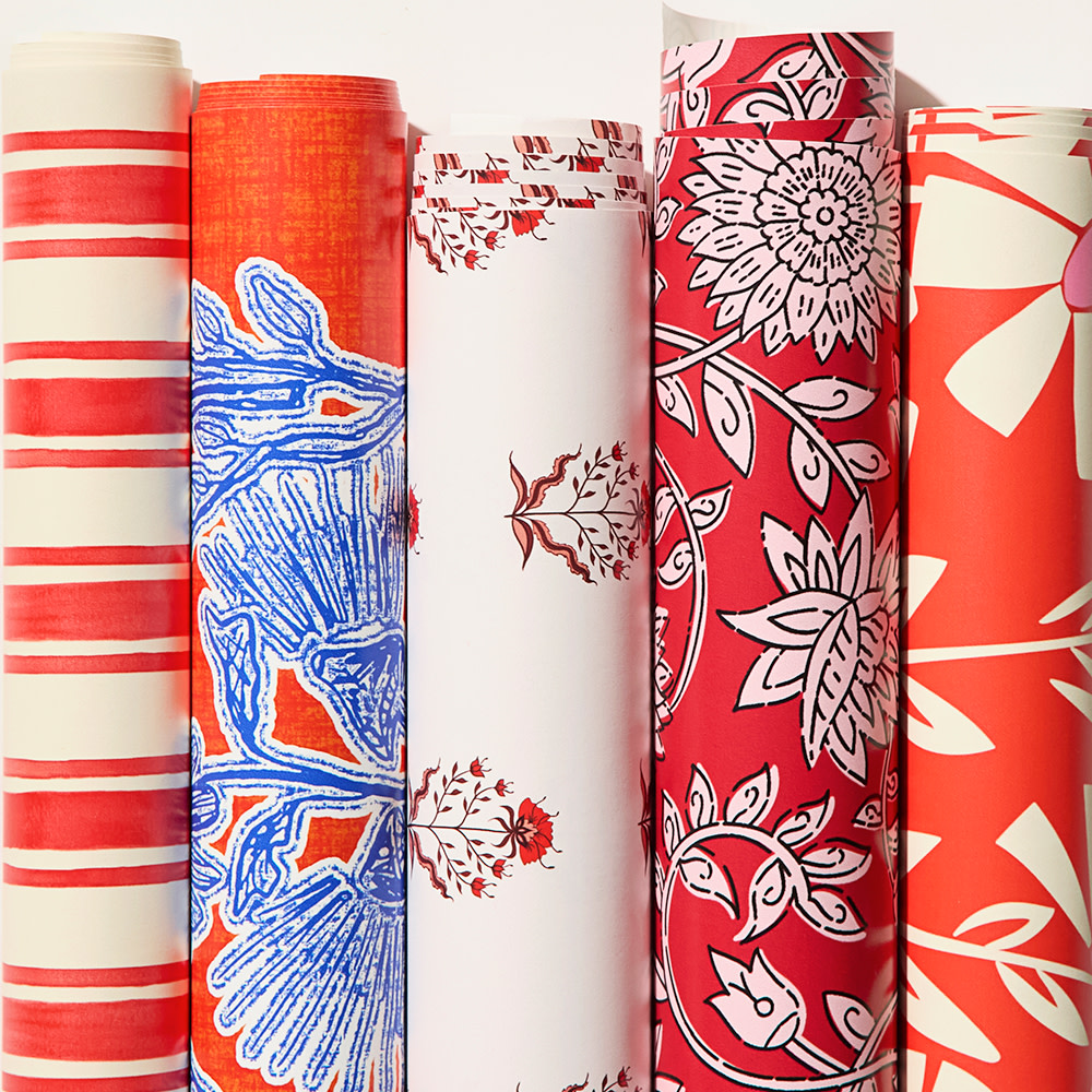 Rolls of red wallpaper.