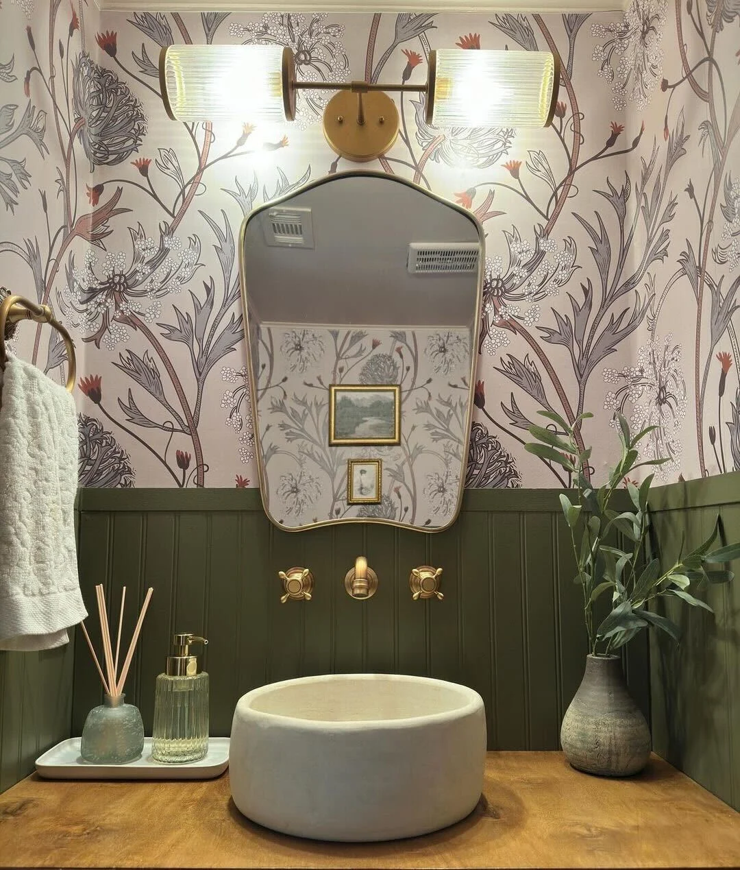 Bathroom with queen annes lace wallpaper.