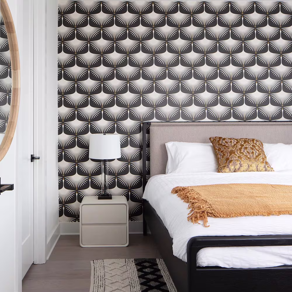 Art deco swan wallpaper in a bedroom.