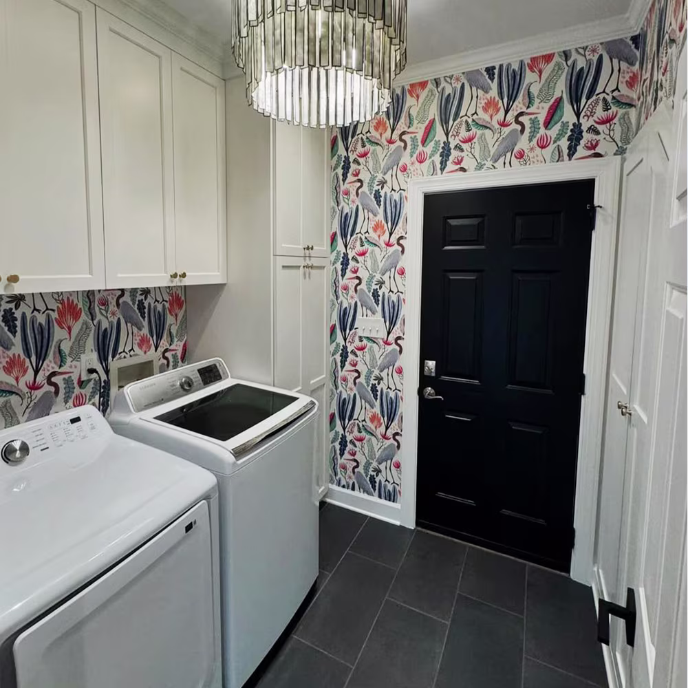 Heron wallpaper in a laundry room