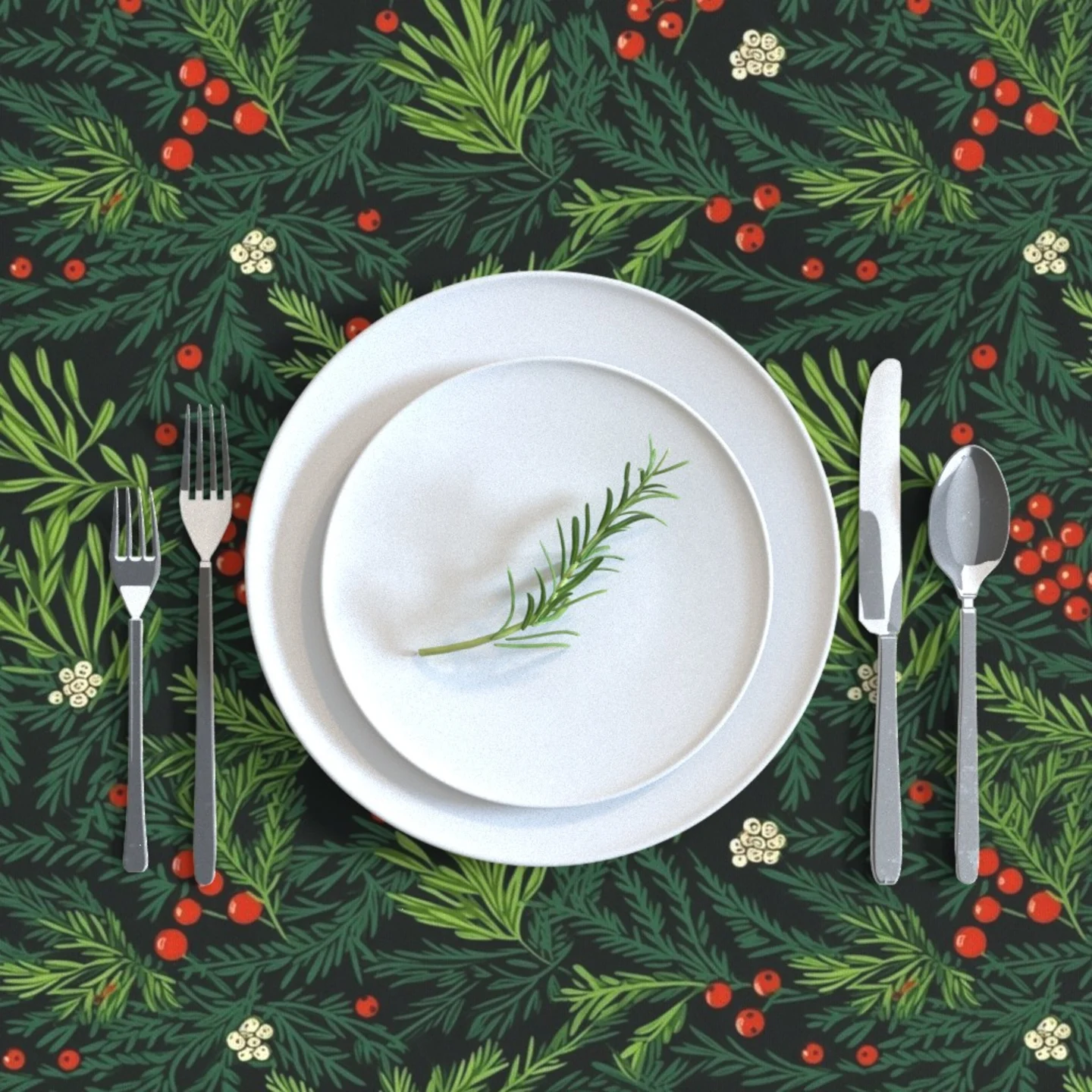 A plate and cutlery on top of a cheerful green Christmas botanical tablecloth