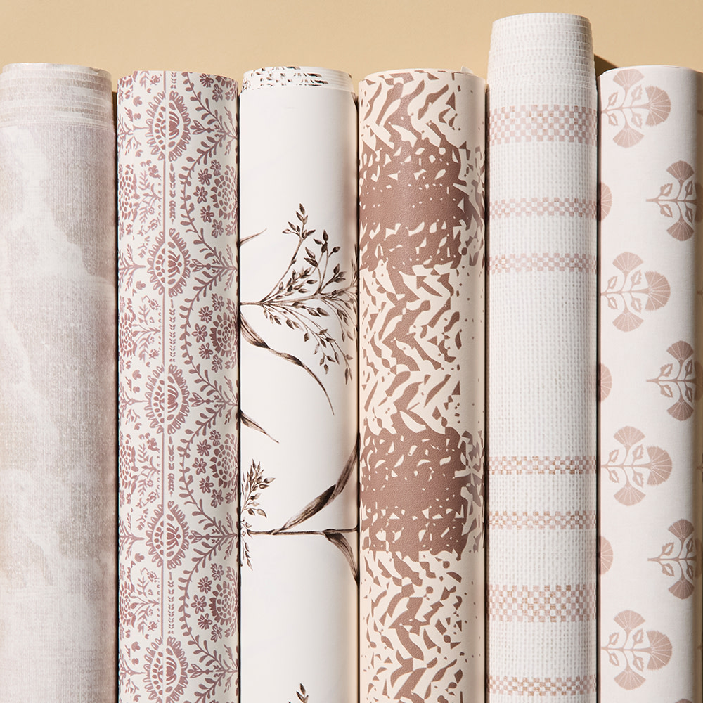 Rolls of neutral wallpaper.