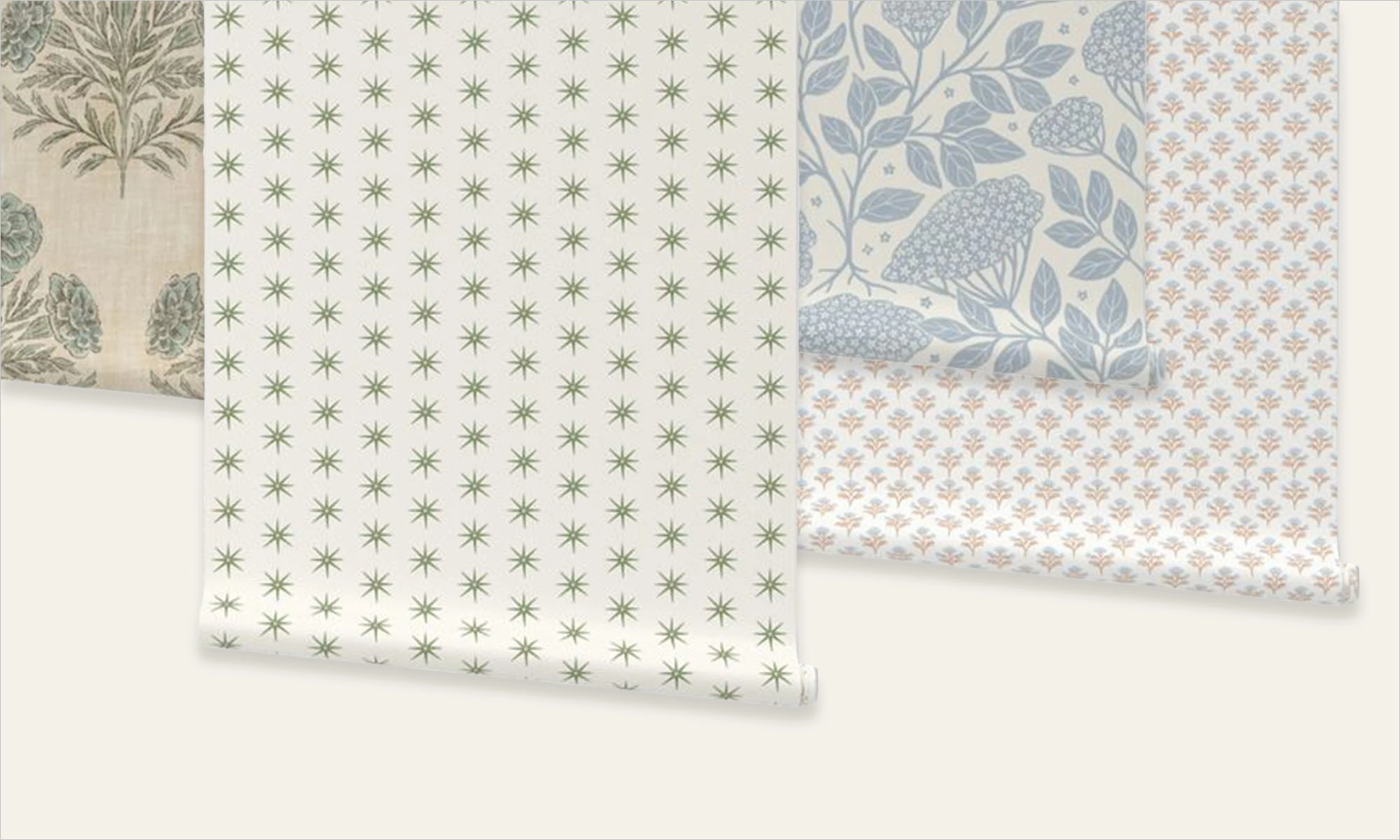 An assortment of pastel neutral wallpaper rolls