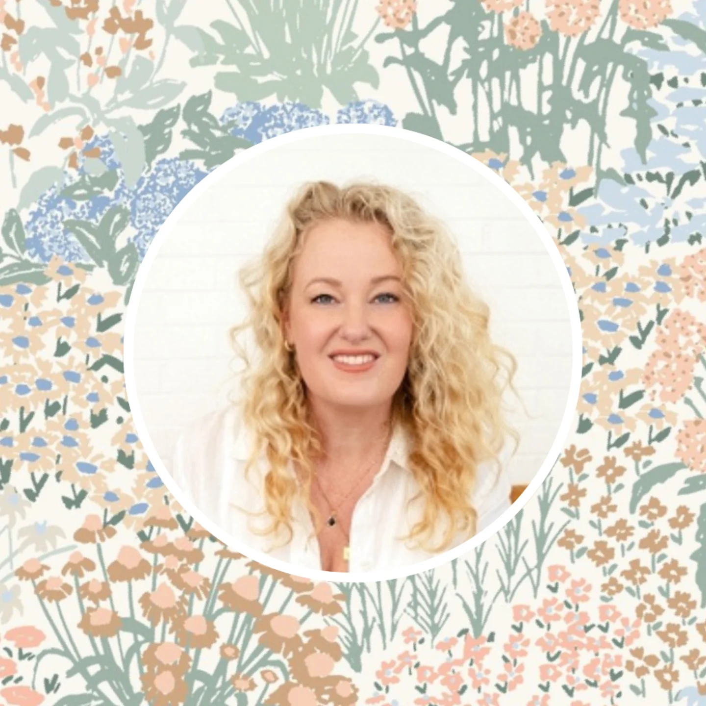 Fleur Crawford of Hufton Studio in front of her garden bloom floral design.