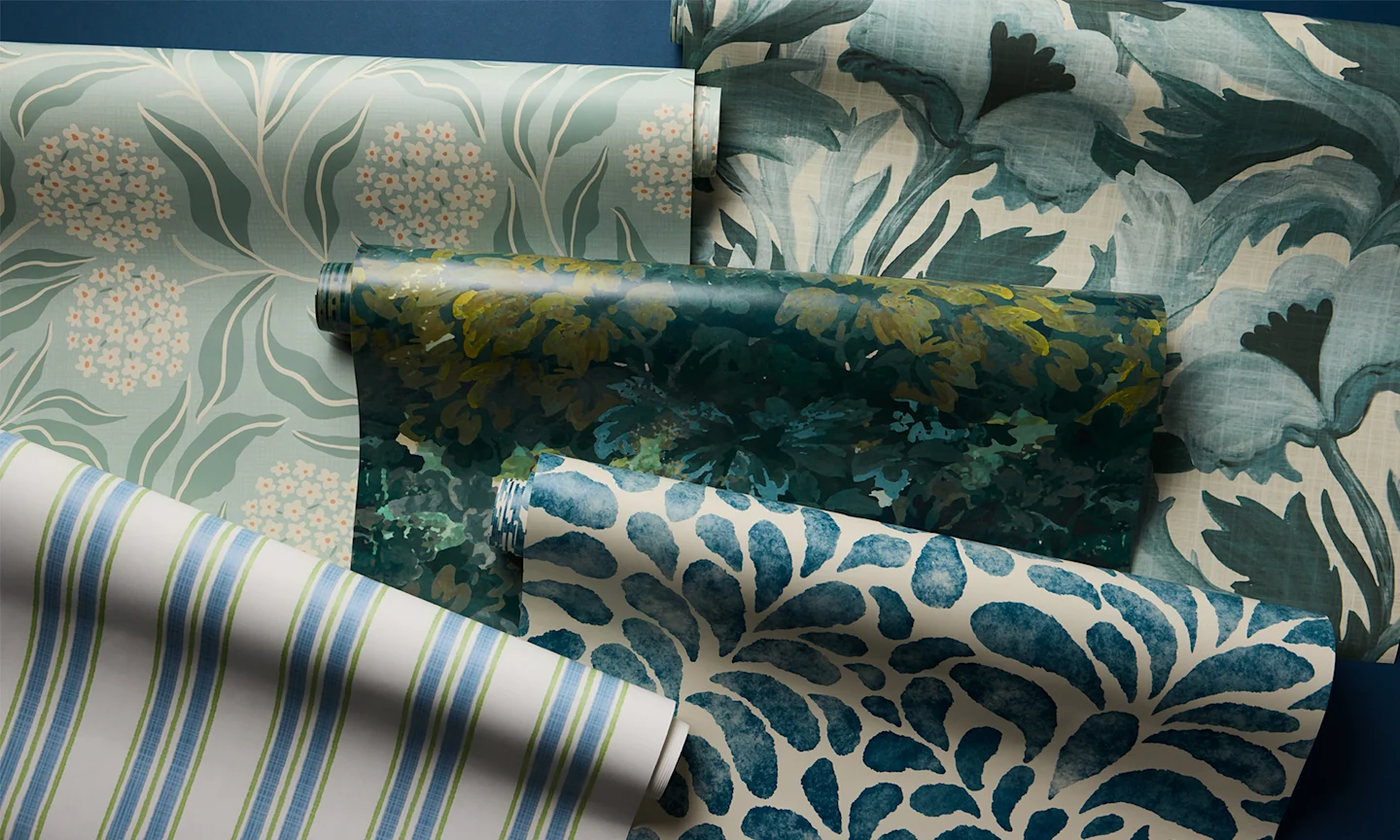 Rolls of calming blue wallpapers.
