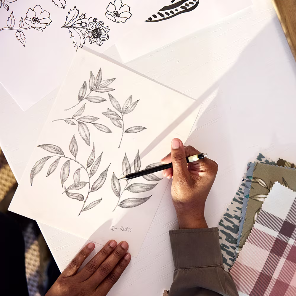 Annette Brown sketching a botanical design