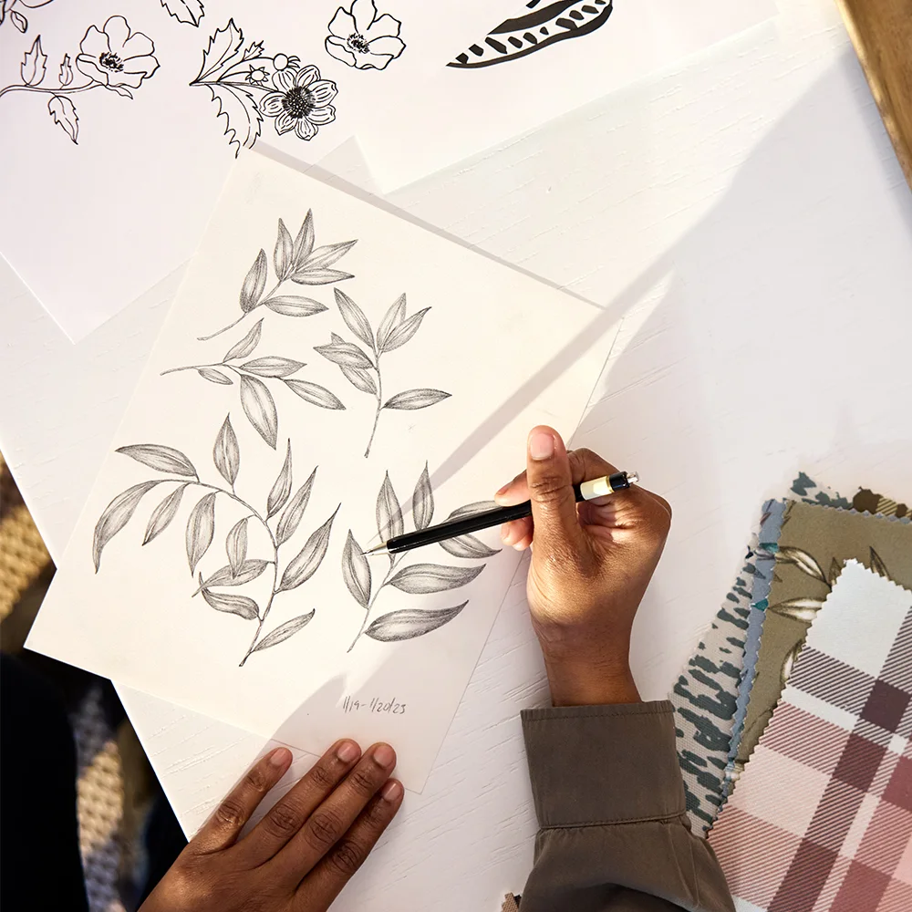 Annette Brown sketching a botanical design