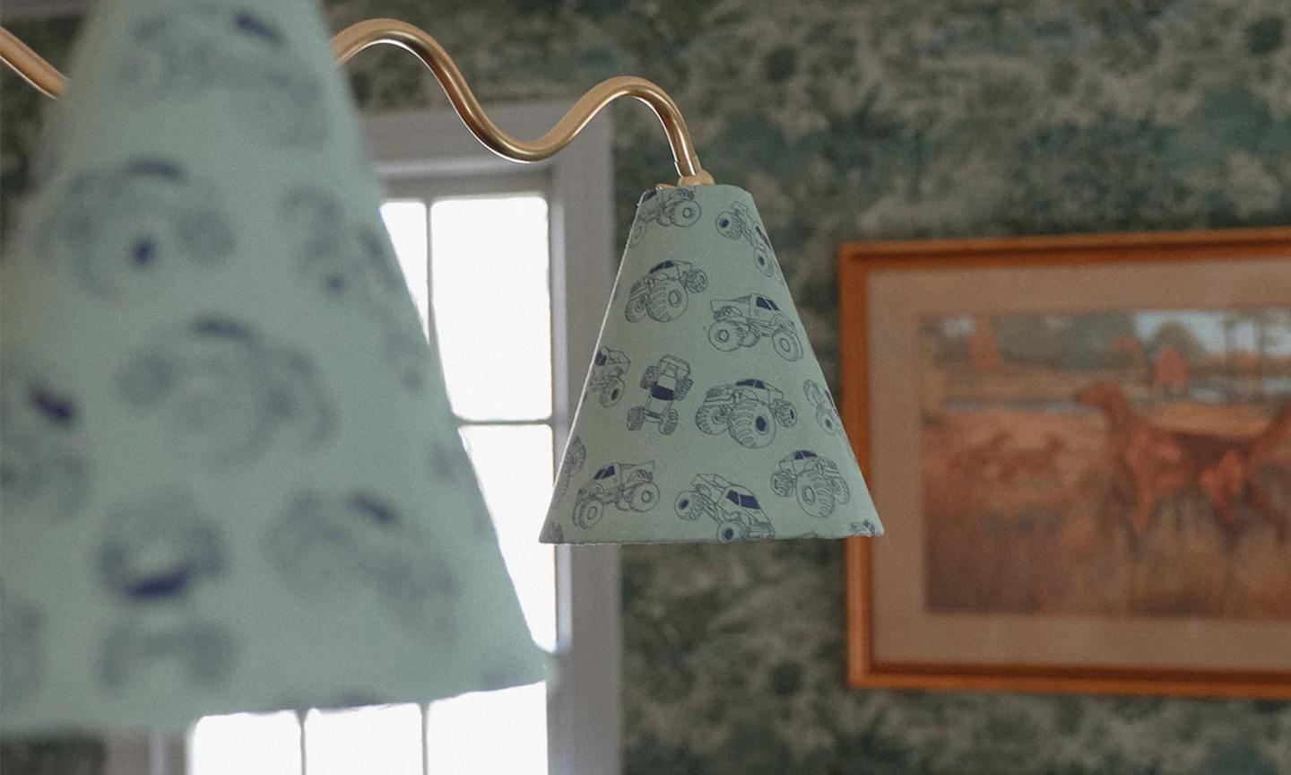 Custom lampshades  made with green monster truck printed fabric.