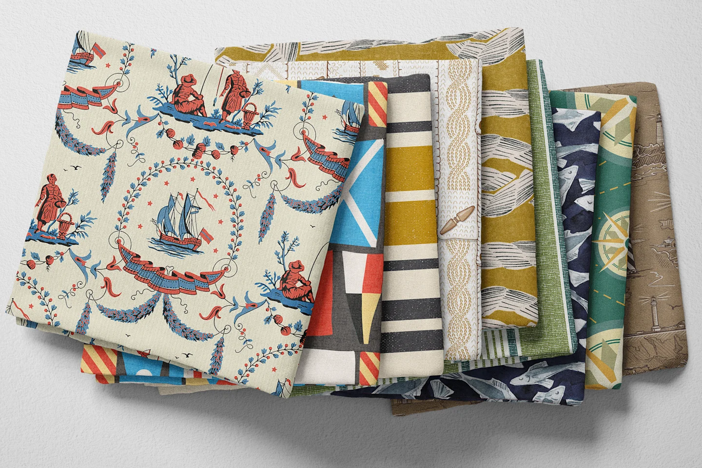 Colorful folded Spoonflower fabric with a vintage fisherman or fishing theme