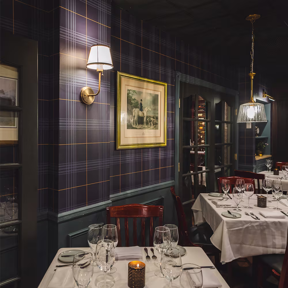 Restaurant with navy plaid wallpaper by Spoonflower artist jolou_design.