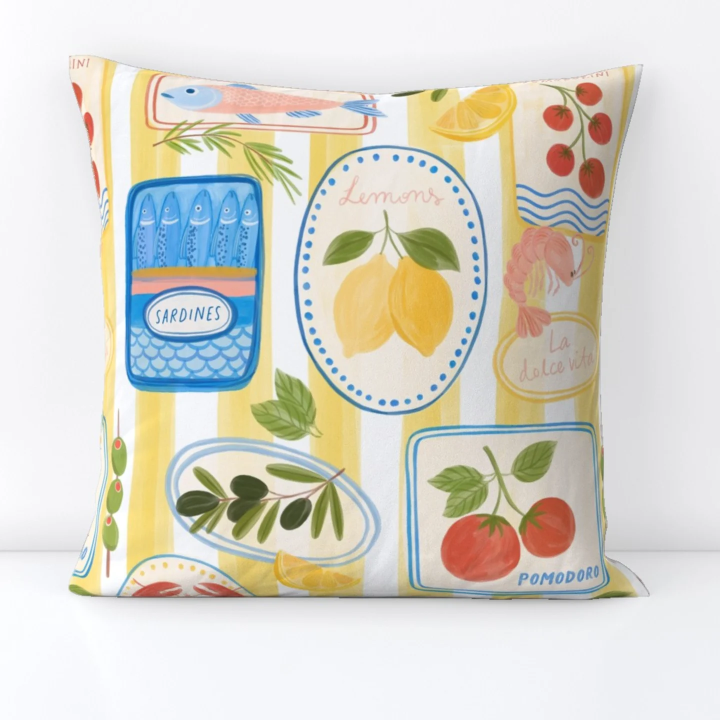 A throw pillow with a Mediterranean print