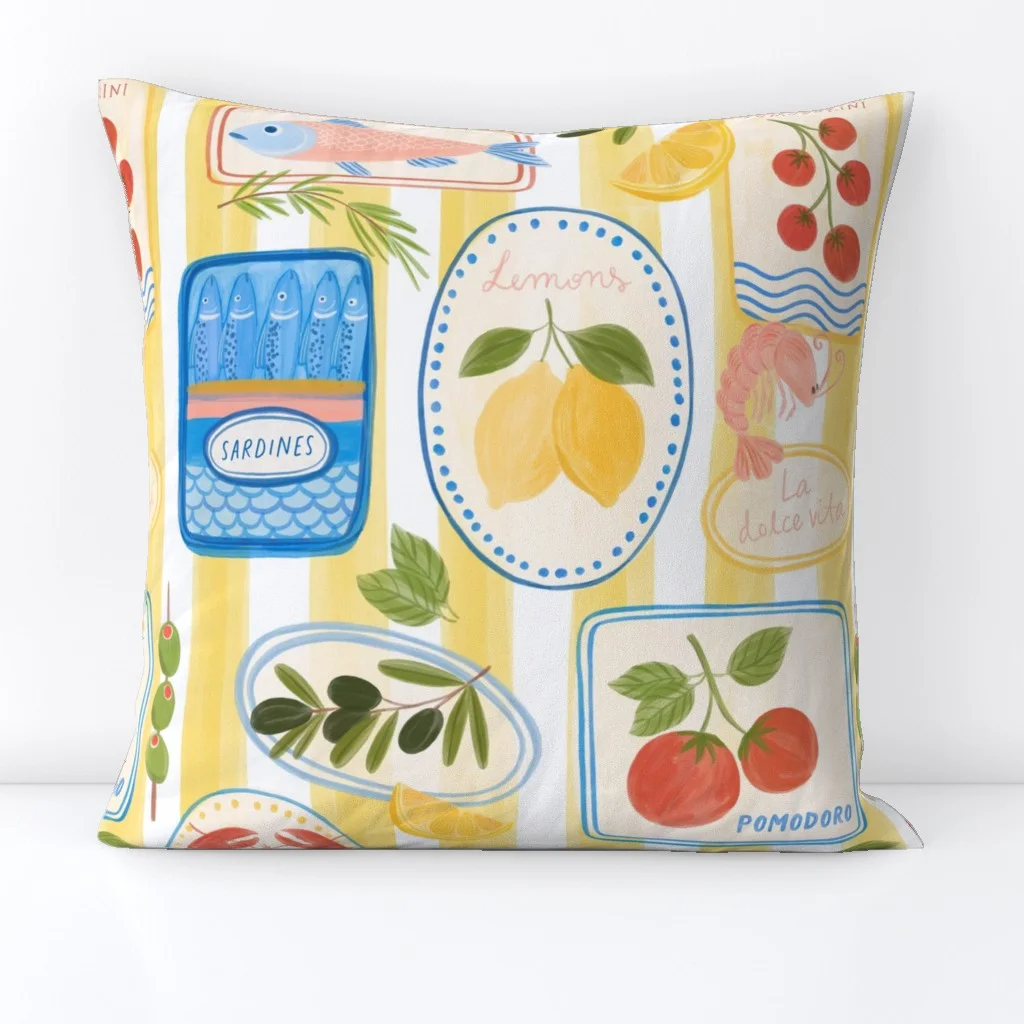 A throw pillow with a Mediterranean print