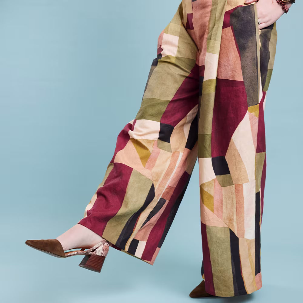 A model wearing pants made with Essex Linen