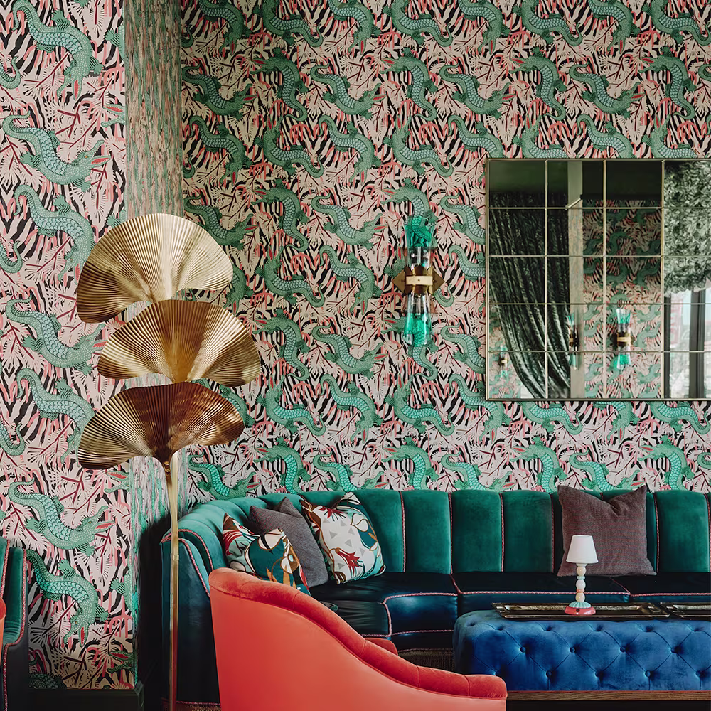 Living area with wallpaper in BAZAAR MAXIMA GATOR  by holli_zollinger with a teal velvet couch.
