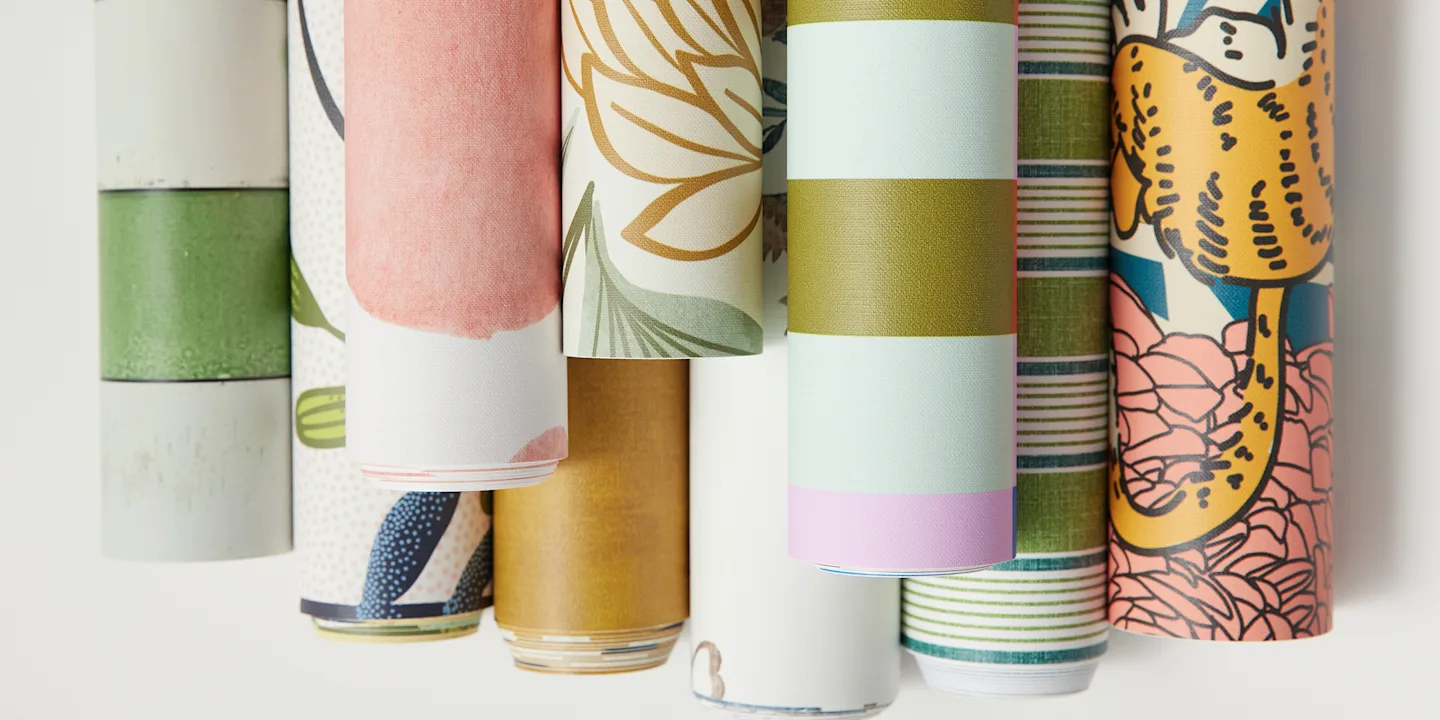 Rolls of peel and stick wallpaper.
