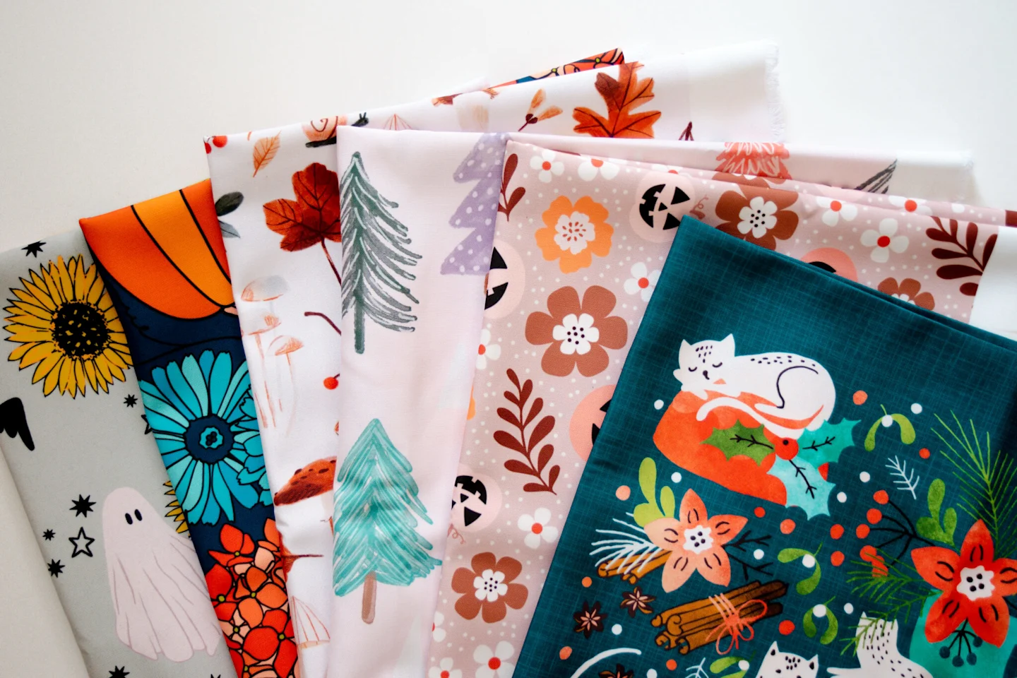 Finished garden flags laid out on a table