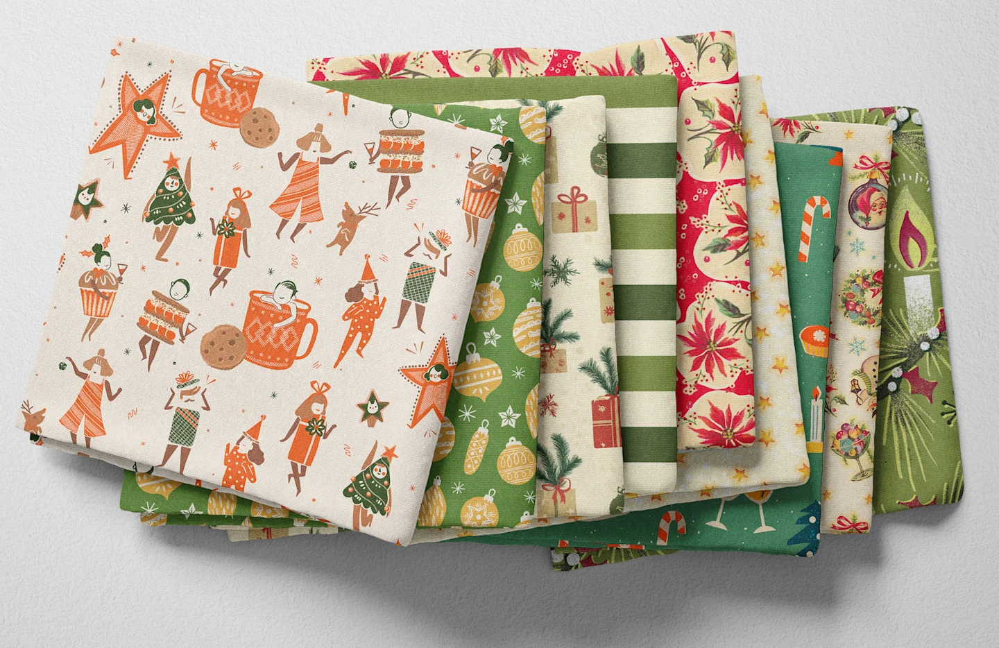 Colorful folded Spoonflower fabric with a midcentury modern christmas theme.