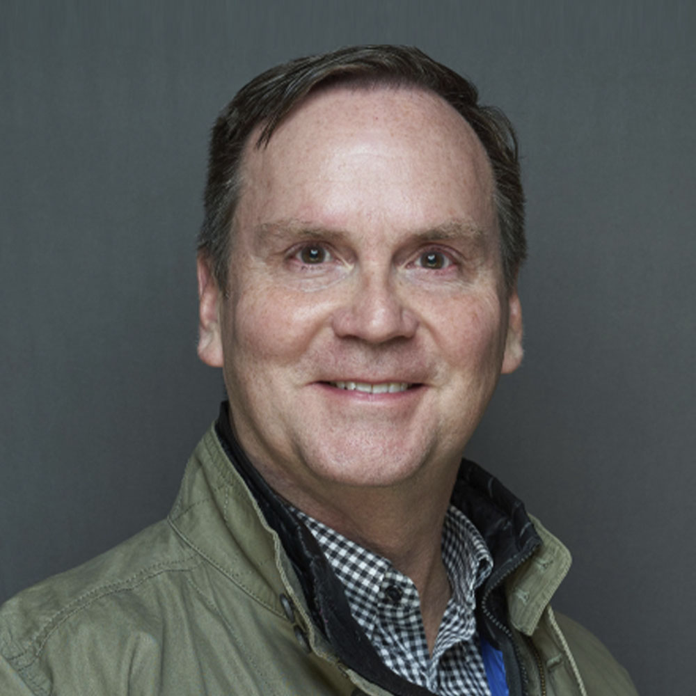 A headshot of Bruce McClure, Senior Interior Architect, of Omni Hotels and Resorts.