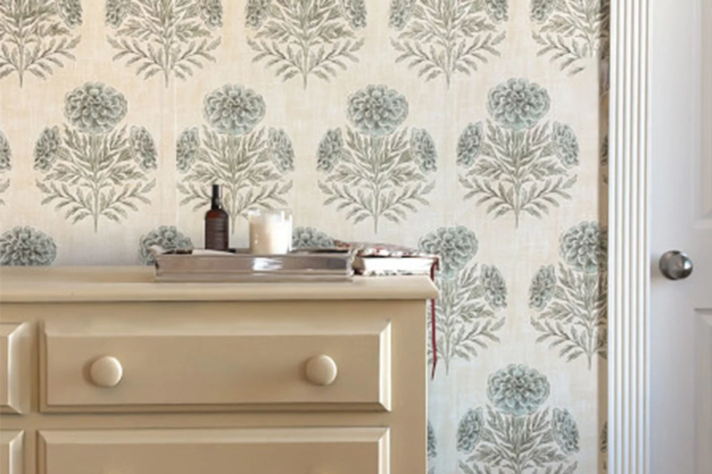 Spoonflower grasscloth wallpaper paired with a butter yellow painted dresser.