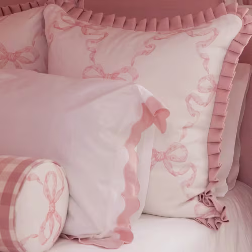Pink bow bed pillows and shams