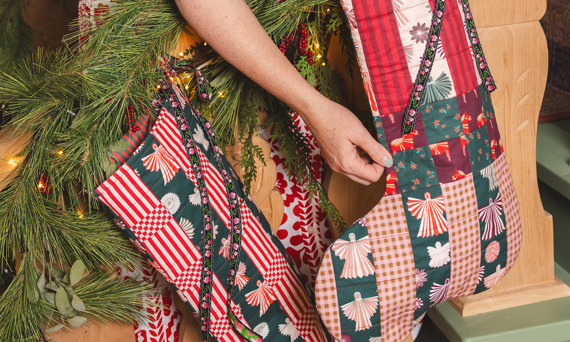 Brittany Jepsen with handmade Christmas stockings.