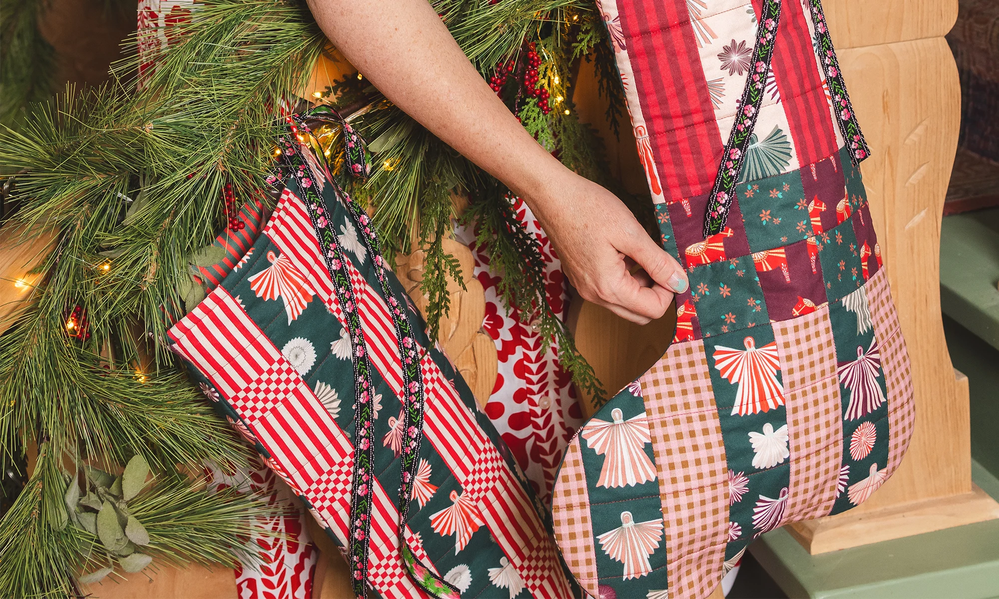 Brittany Jepsen with handmade Christmas stockings.