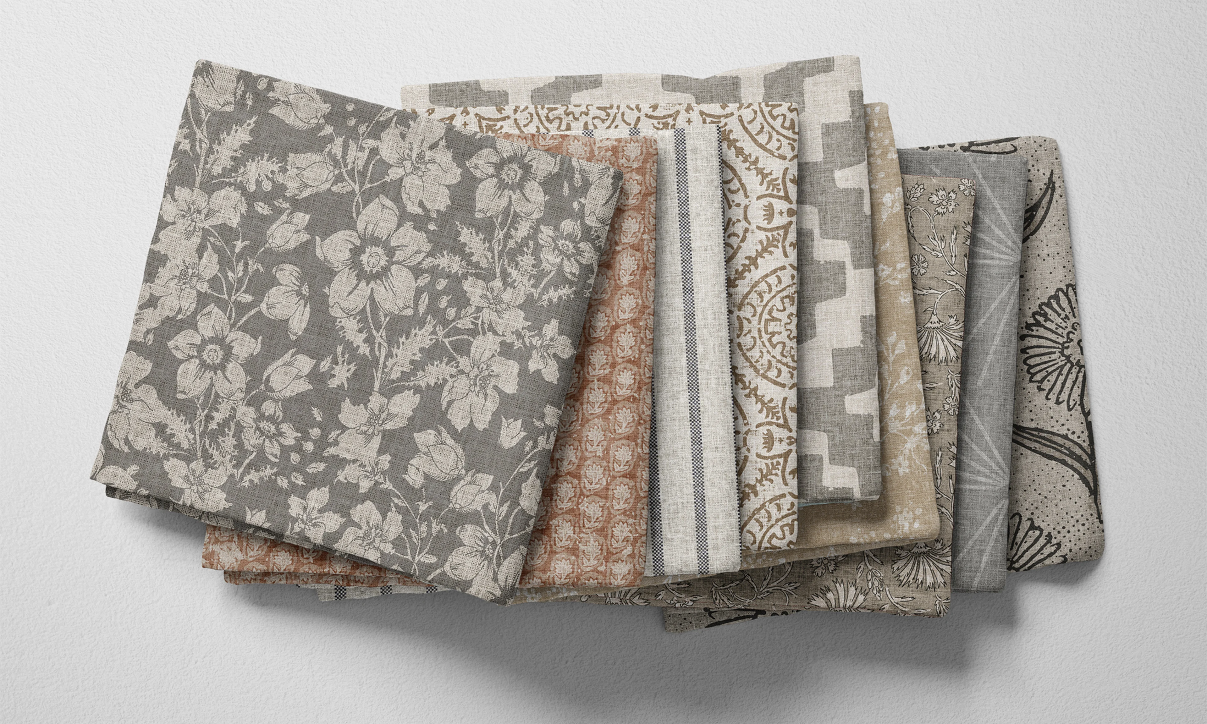 A selection of folded fabric by Spoonflower