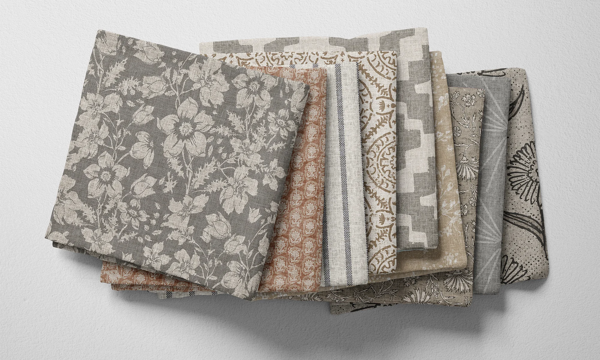 A selection of folded fabric by Spoonflower