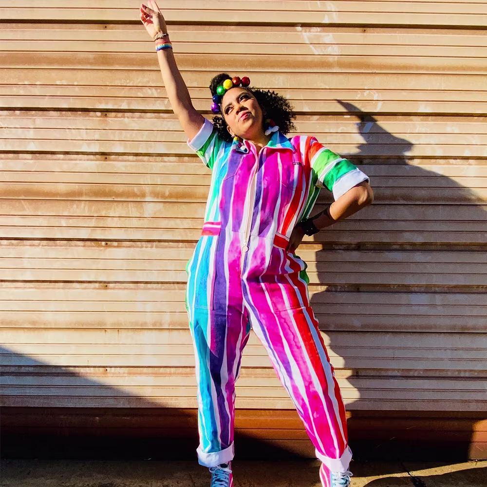 Woman wearing rainbow jumpsuit