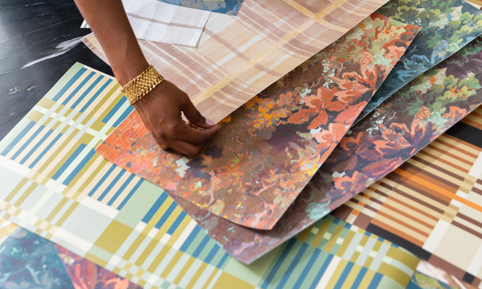 Swatches of wallpaper from the Indigo Pruitt heritage charm capsule collection.